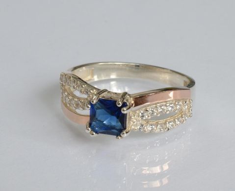 Серебряное кольцо с золотыми вставками 136к 15