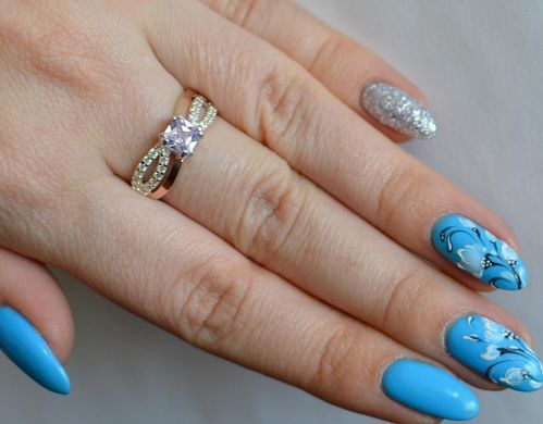 Серебряное кольцо с золотыми вставками 136к 15