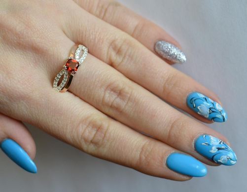 Серебряное кольцо с золотыми вставками 136к 15
