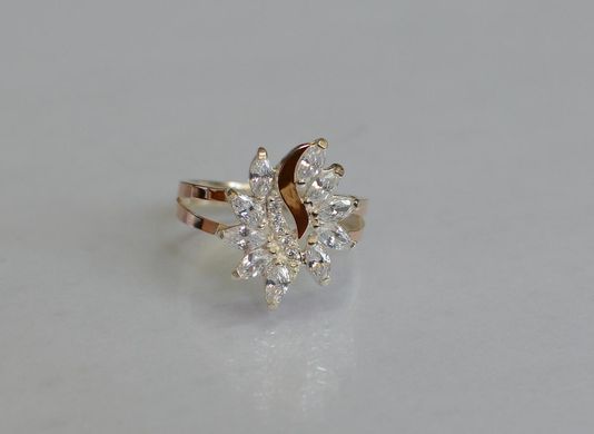 Серебряное кольцо с золотыми вставками 170к 15