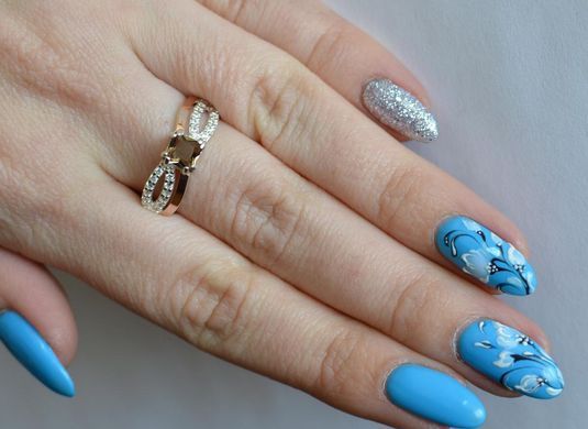Серебряное кольцо с золотыми вставками 136к 15
