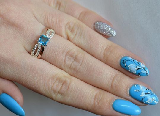 Серебряное кольцо с золотыми вставками 136к 15