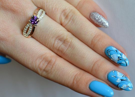Серебряное кольцо с золотыми вставками 136к 15
