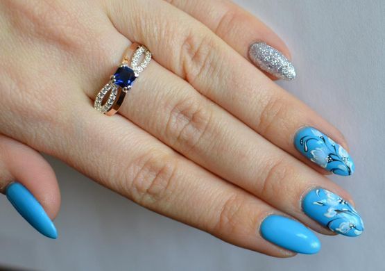 Серебряное кольцо с золотыми вставками 136к 15