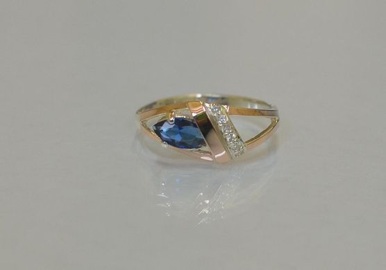 Срібне кільце зі вставками із золота 050к 15
