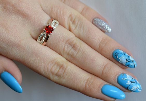 Серебряное кольцо с золотыми вставками 136к 15
