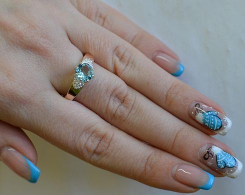 Серебряное кольцо с золотыми вставками 124к 15