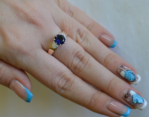 Серебряное кольцо с золотыми вставками 124к 15