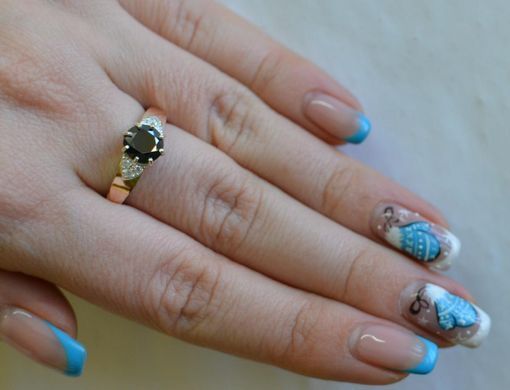 Серебряное кольцо с золотыми вставками 124к 15