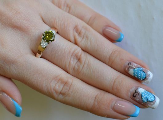Серебряное кольцо с золотыми вставками 124к 15
