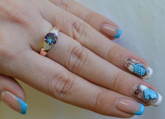 Серебряное кольцо с золотыми вставками 124к 15