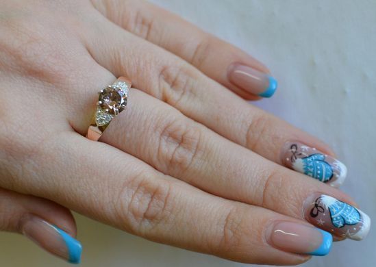 Серебряное кольцо с золотыми вставками 124к 15