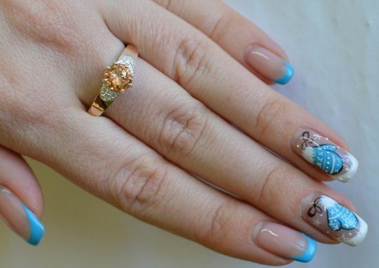 Серебряное кольцо с золотыми вставками 124к 15