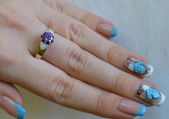 Серебряное кольцо с золотыми вставками 124к 15