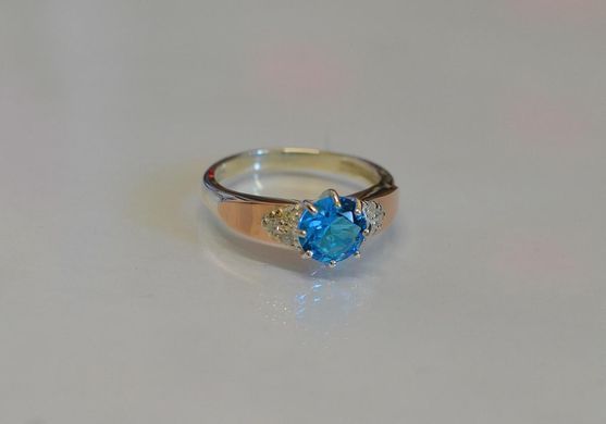 Серебряное кольцо с золотыми вставками 124к 15