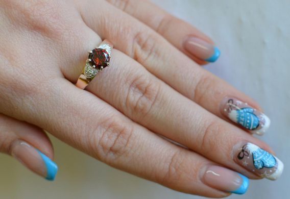 Серебряное кольцо с золотыми вставками 124к 15