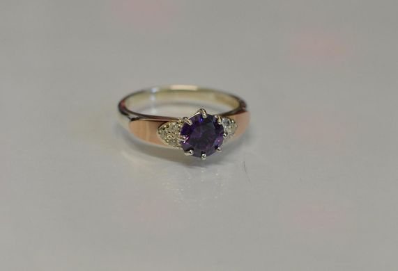 Серебряное кольцо с золотыми вставками 124к 15
