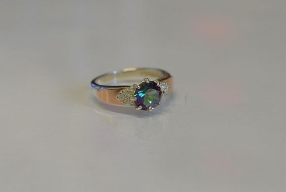 Серебряное кольцо с золотыми вставками 124к 15