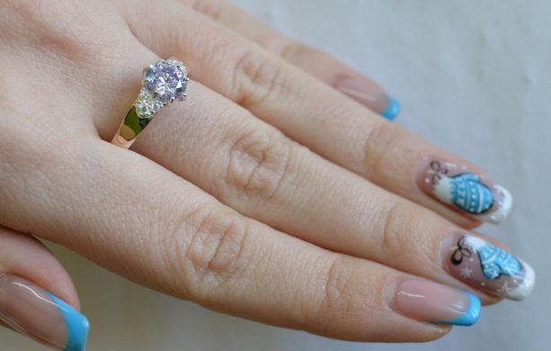 Серебряное кольцо с золотыми вставками 124к 15